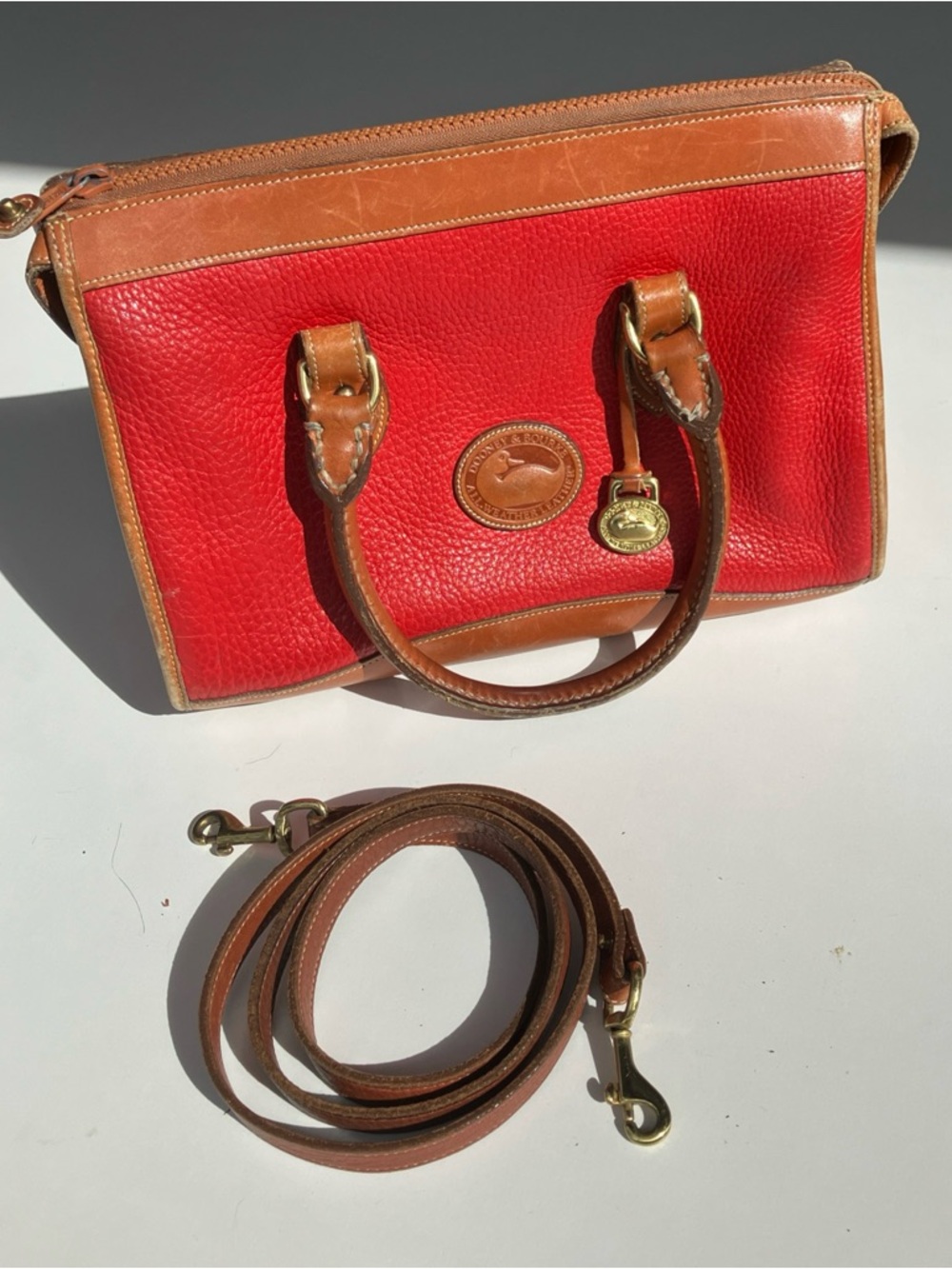 Vintage Dooney and Bourke red leather all weather leather bag 2.5 pounds heavy.